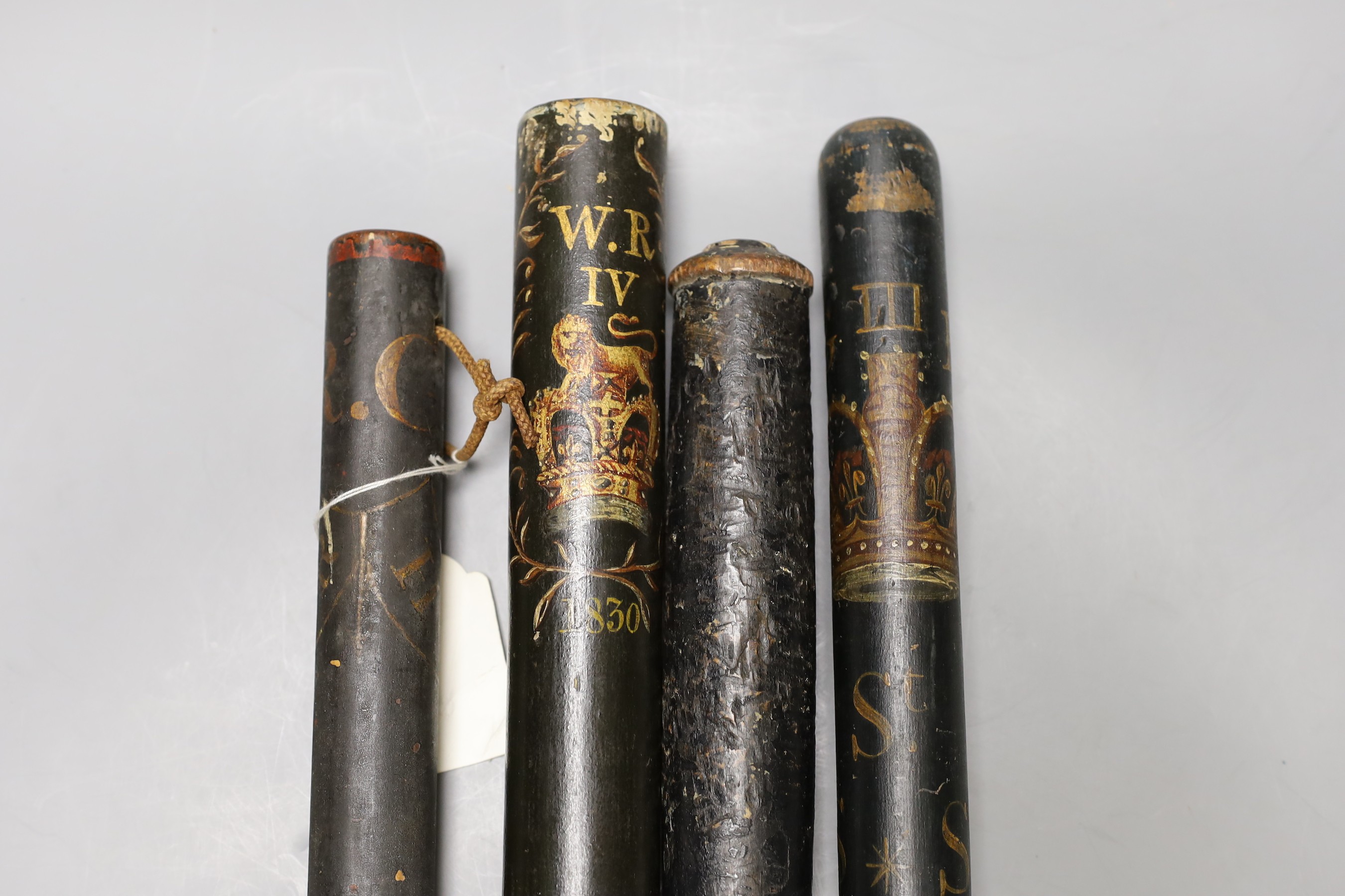 An early 19th century ‘cudgel’ truncheon a George IV painted ‘crown and honour’ truncheon, a George III painted truncheon and another William IV painted truncheon